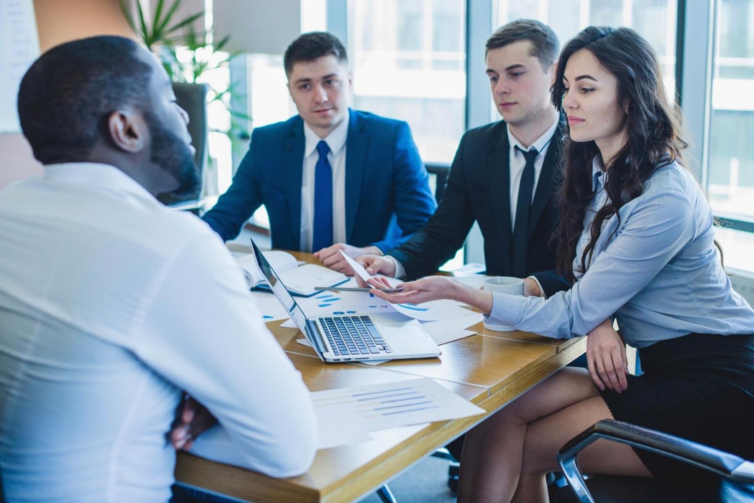 People collaborating in a modern learning environment